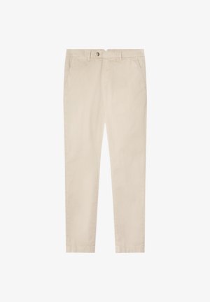 Chinos beige con un diseño de pierna recta, hechos de algodón, que cuentan con bolsillos delanteros, una cremallera y un cierre de botón. Textura suave.
