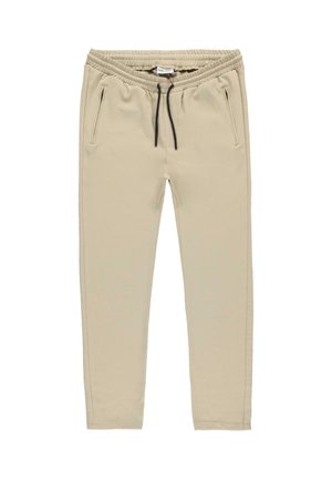 Beige joggingbroek met elastische tailleband en zwart trekkoord, voorzien van zijzakken met rits en taps toelopende pijpen.