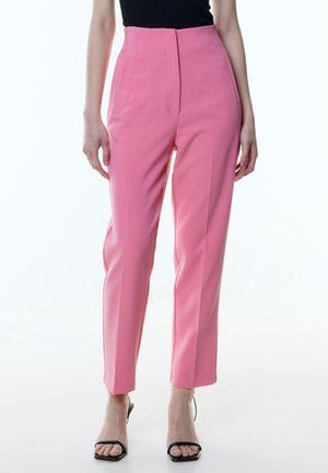 High-waisted pink pants with a tailored fit, featuring vertical seams, side pockets, and a smooth fabric texture. Accented with a clean silhouette.