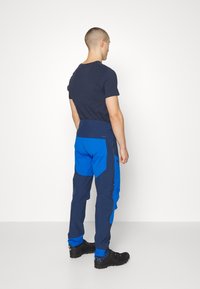 Norrøna FJØRÅ PANTS - Calças de ciclismo - indigo night/olympian blue