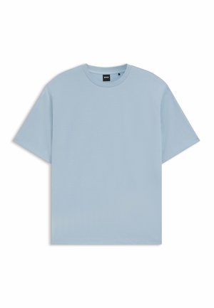 Lichtblauwe T-shirt met korte mouwen, gemaakt van zachte katoen, met een ronde halslijn en een relaxed fit, voorzien van een label aan de binnenkant van de hals.