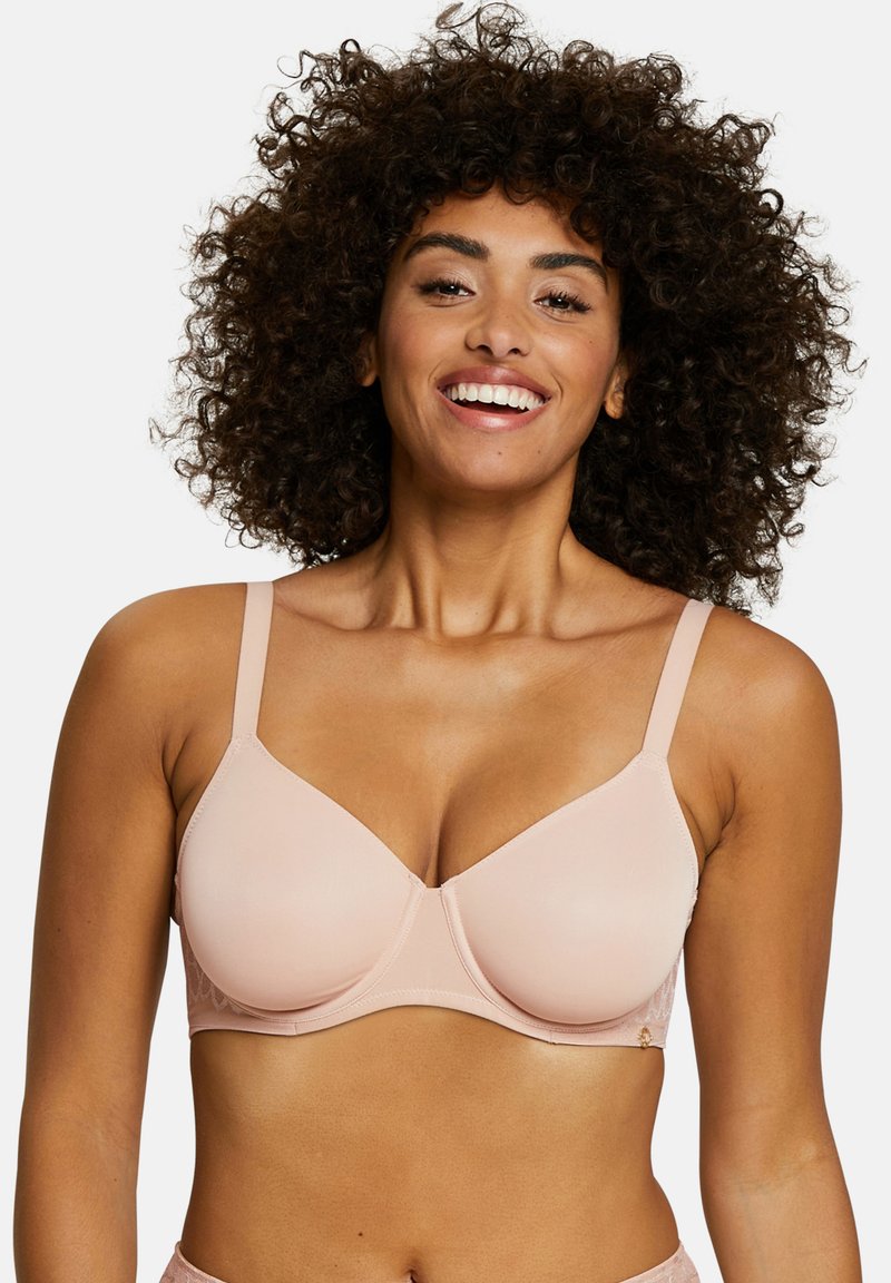 Light pink bra featuring smooth cups, adjustable straps, and lace accents on the sides, with a seamless design for a clean silhouette.