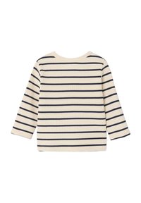 Ribbed long-sleeve top in cream with navy horizontal stripes. Features a round neckline and straight hem. Soft texture.