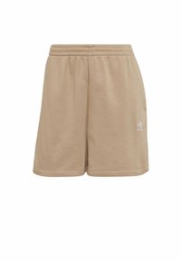 Beżowe bawełniane szorty z elastycznym pasem, bocznymi kieszeniami i małym białym logo na lewej udzie. Gładka tekstura i luźny krój.