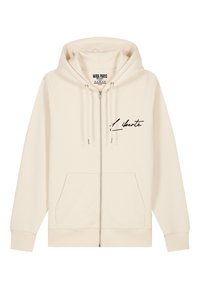 Beige Reißverschluss-Hoodie aus weichem Stoff, mit einer verstellbaren Kapuze, Fronttaschen und schwarzem, kursivem Text mit der Aufschrift "Liberté" auf der Brust.