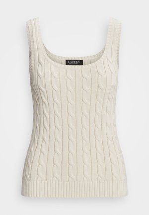 Gaišs krēms adīts topiņš ar kabeli, apaļo kaklu un platām siksnām. Rievojuma apakšdaļa. Etiķete redzama kakla rajonā.