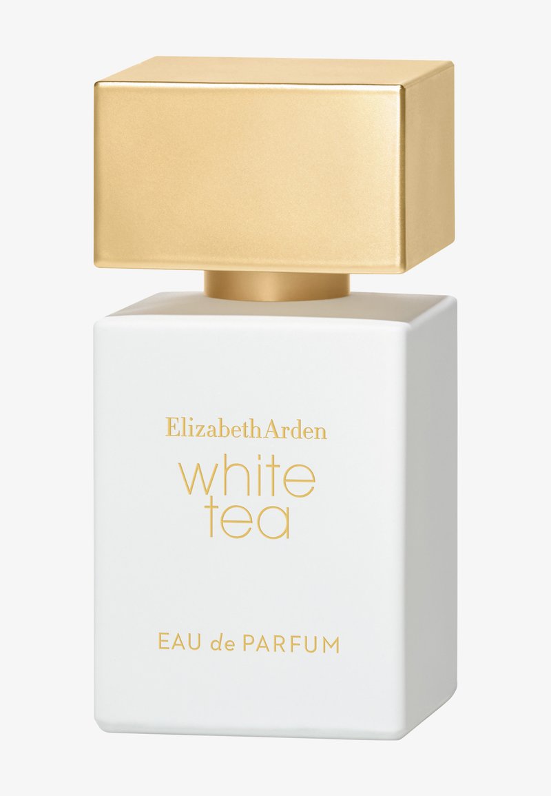 Frasco de perfume blanco y rectangular con tapón dorado rectangular, etiquetado con el texto dorado “Elizabeth Arden White Tea Eau de Parfum”.