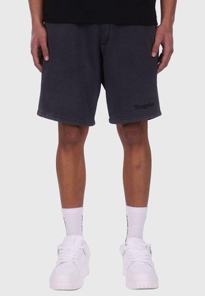 Mørke grå treningsshorts laget av myk stoff, med rett snitt, og med et brodert logo på venstre ben og sydd kantdetaljer.