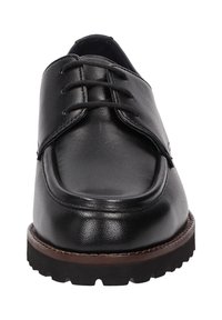 Scarpa nera in pelle con lacci, punta arrotondata, finitura liscia e suola in gomma marrone a contrasto con un motivo di battistrada testurizzato.