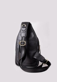 Black leather shoulder bag with a structured shape, featuring a zip closure, adjustable strap, and gold-tone hardware accents.