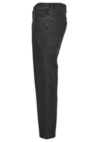 Sorte denim jeans med lige pasform. Funktioner inkluderer lynlås, fem lommer og stikninger. Rent design og holdbart materiale.
