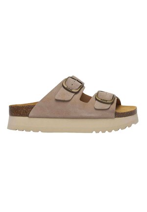 Sandalias de ante tipo slip-on en beige claro con dos hebillas ajustables. Presentan una plantilla de corcho natural y una suela resistente y ligeramente texturizada.