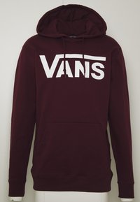 Bordový mikinový sveter s kapucňou vyrobený z bavlny, s predným vreckom. Dôraz je kladený na veľké biele logo "VANS" na hrudi. Ribbed manžety a lem.