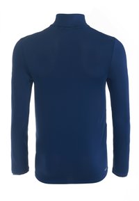 Merenkulkuneule pitkällä hihalla, jossa on korkea kaulus, valmistettu teksturoidusta kankaasta. Ominaisuuksiin kuuluu istuva muotoilu ja sileät saumat mukavuutta varten.