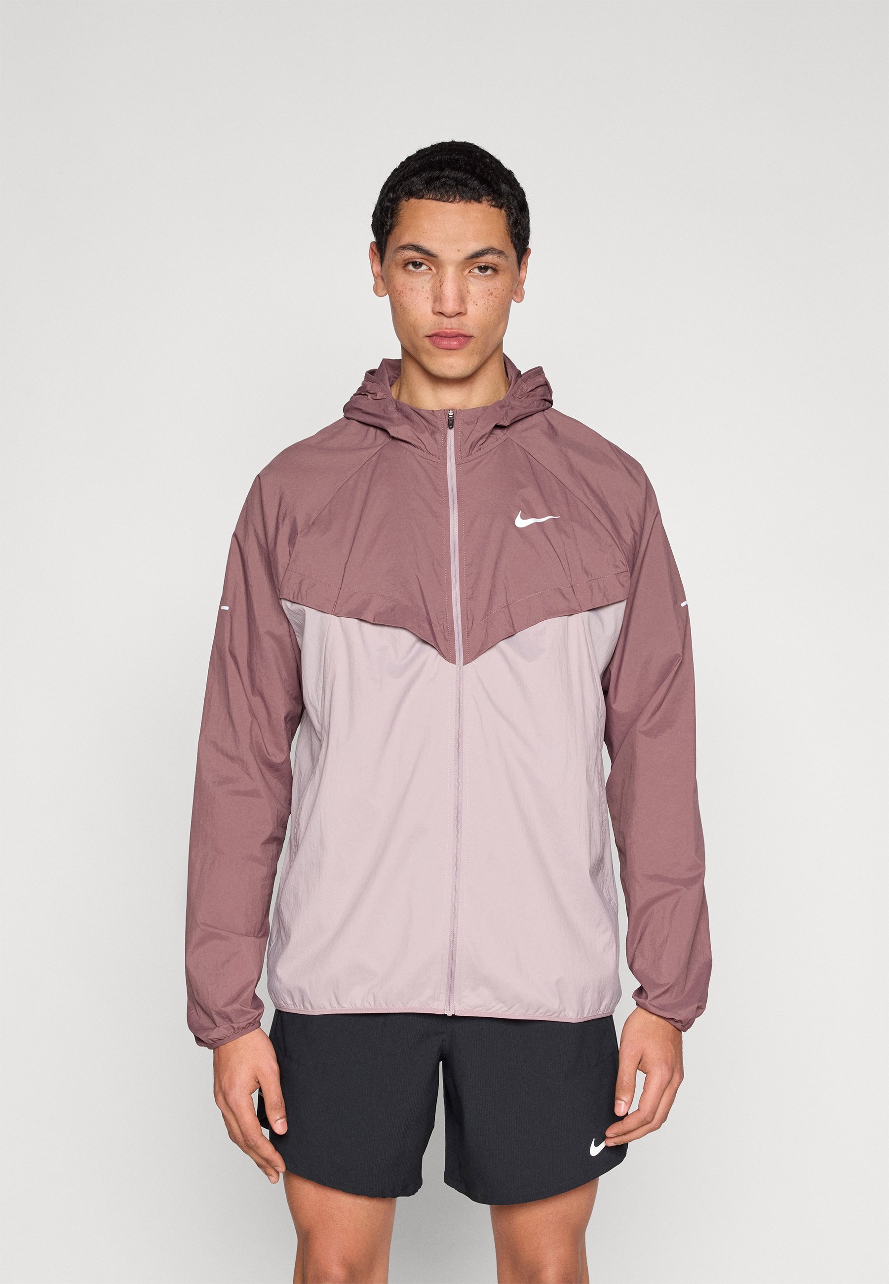 nike reflective wind breaker