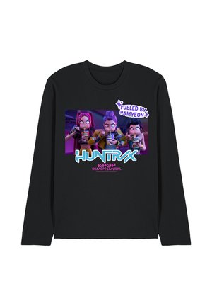 Black long-sleeve shirt with cartoon characters eating ramyeon, text "Fueled by Ramyeon," "HUNTRX," and "K-POP Demon Hunters."