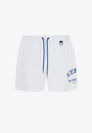 Pantaloni da bagno bianchi con lacci blu e dettagli laterali. Caratterizzati dalla stampa in blu della scritta "ICEB" e "MILANO" sulla parte frontale. Materiale leggero.