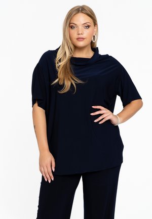 Navyblauwe top in een zachte, soepel vallende stof met korte mouwen, een relaxte pasvorm en een kolletje, met een zijzakdetail.
