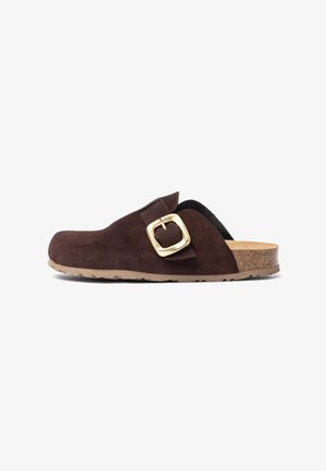 Brown suede clog with a wide, rounded toe and a gold-toned buckle accent. Cork footbed and textured rubber sole for grip.