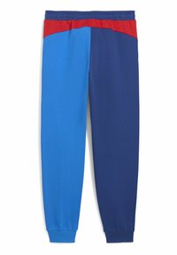 Farbenfrohe Sweatpants mit einem roten Bund, einem blauen Vorderteil und dunkelblauen Beinen. Hergestellt aus weichem, dehnbarem Stoff.
