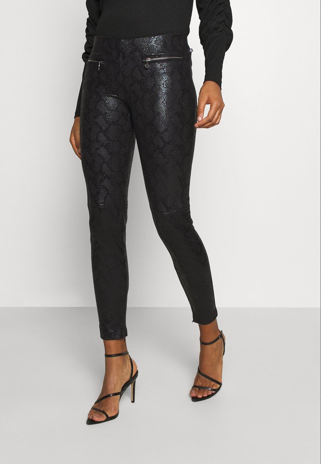 SNAKEY - Pantalones - black