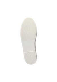 Suela de una zapatilla con una superficie de goma blanca texturizada, que presenta un patrón de espiga para tracción y una sección central lisa.