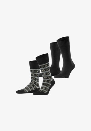 Deux paires de chaussettes : une noire unie, l'autre à motifs géométriques noirs, gris et beige sur un fond sombre. Bords côtelés.