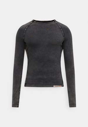 Mörkgrå T-shirt med lång ärm, rund halsringning, ribbade muddar och blekt textur. Etikett längst ner med varumärkesdetalj.