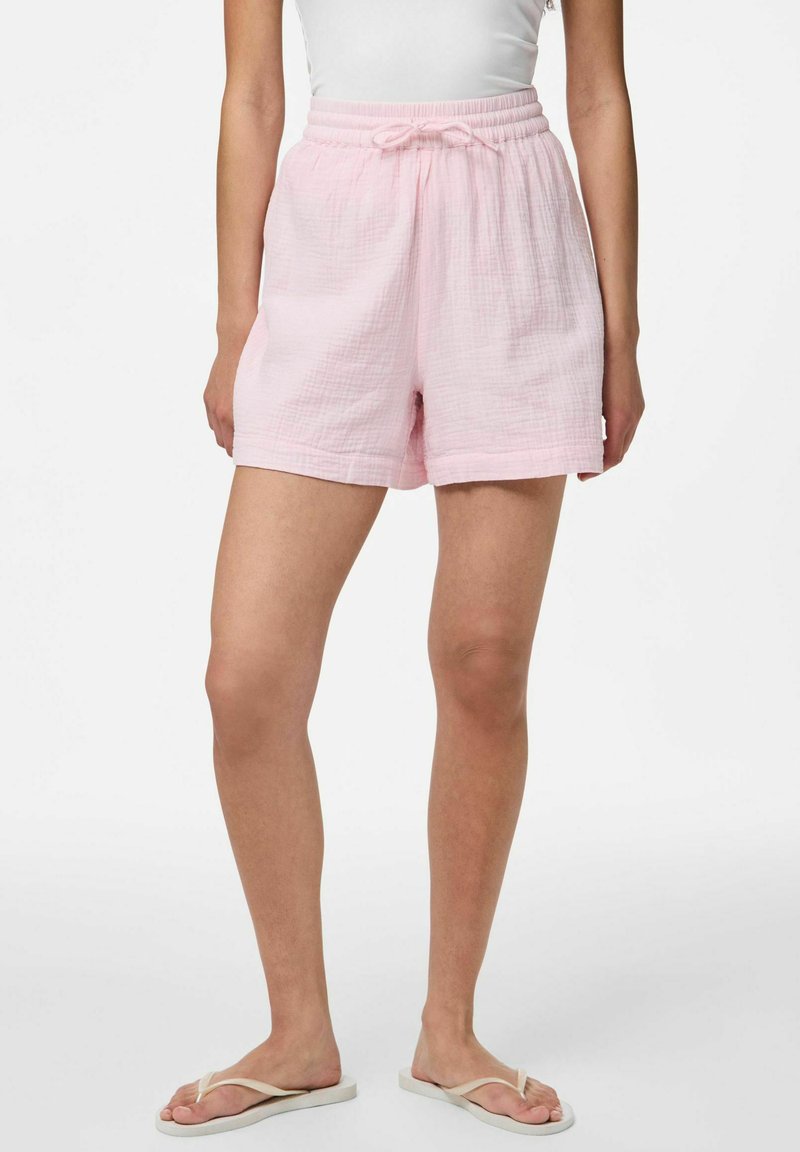 Pantaloni corti in tessuto intrecciato di un rosa chiaro, con vita elastica e coulisse. Presentano una vestibilità comoda e una lunghezza fino a metà coscia. Texture liscia.