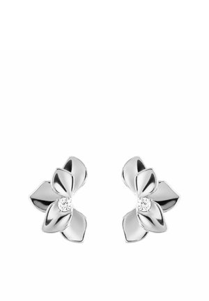 Coppia di orecchini a bottone in argento a forma di fiore con tre petali e una piccola pietra chiara rotonda al centro di ogni fiore.