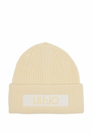 Kreemist lõngast kootud beanie müts, millel on keeratult serv. Omab ristkülikukujulist silti, millel on heledat värvi "LIU·JO" logo. Struktuurne, pehme villane materjal.