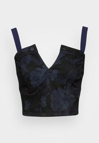 Top corto in tessuto scuro, con un motivo floreale in tonalità di blu, design a V e spalline regolabili in blu navy con dettagli in bottone.