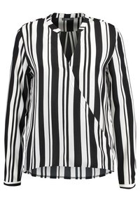 Blouse à rayures noires et blanches avec manches longues, décolleté en V et coupe ample. Tissu doux avec une texture lisse.