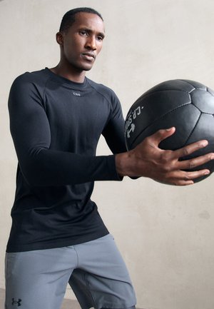 STRIDE SEAMLESS LONGSLEEVE MEN - Ilgarankovis viršutinės dalies drabužis - black