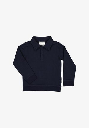 Laivastonsininen pitkähihaisen polo-paita, valmistettu puuvillasta. Siinä on kaulus, nepparityyppinen nappilista ja ribbineulotut hihansuut. Yksinkertainen muotoilu, jossa on pieni merkki sivulla.