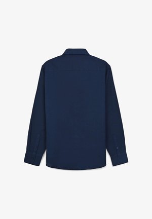 Navy blue long-sleeve shirt with a collared neckline and barrel cuffs. Made of smooth fabric, it features a clean, seamless back design.