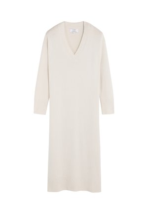 Vestido de suéter en crema suave con escote en V, hecho de tejido de punto. Presenta mangas de tres cuartos y agujeros decorativos a lo largo del escote y los puños.