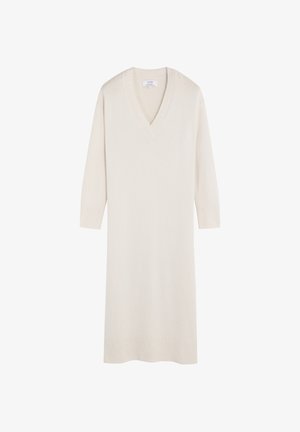 Vestido de suéter en crema suave con escote en V, hecho de tejido de punto. Presenta mangas de tres cuartos y agujeros decorativos a lo largo del escote y los puños.