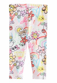 Färgglada tights med vit bakgrund som har en mängd lekfulla tecknade blommor, stjärnor och leende sol-designs i rosa, gult och grönt.