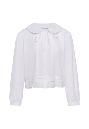 Camicia bianca a maniche lunghe con colletto alla Peter Pan, bottoni sul davanti, fiocco al collo, dettagli a pieghe e orlo in pizzo smerlato.