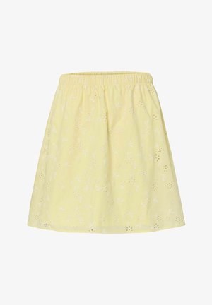 Jupe trapèze jaune avec taille élastique et broderie florale blanche à œillets sur tissu léger.