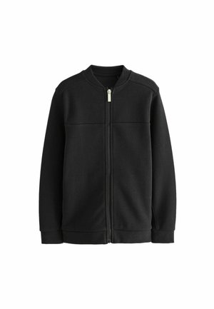 Sort jakke med fuld lynlås, ribbet krave, manchetter og kant, vist på en ensfarvet hvid baggrund.