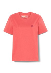 T-shirt en coton corail à manches courtes et col rond. Présente un petit logo Timberland violet sur la poitrine gauche. Texture lisse.