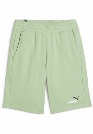 Lysegrønne shorts lavet af blødt stof, med en sort PUMA-logo, elastisk taljebånd og sidelommer for nemhed.
