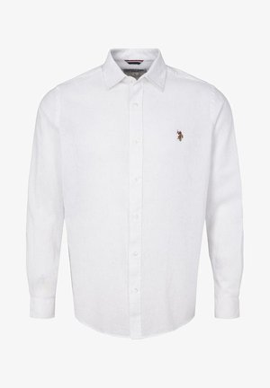 Bela srajca z dolgimi rokavi in gumbom iz lanenega materiala. Ima klasičen ovratnik in majhen vezen detajl na prsih.