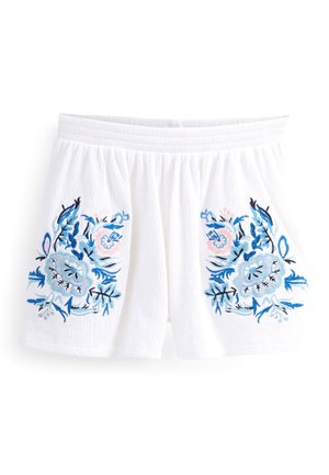 Hvide elastiske shorts med høj talje, oprejst struktur og symmetrisk blå og lyserød blomsterbroderi på hvert ben.