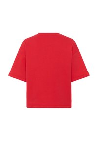 T-shirt rouge à manches courtes et col rond, montré de dos avec un ourlet droit et une coupe décontractée.