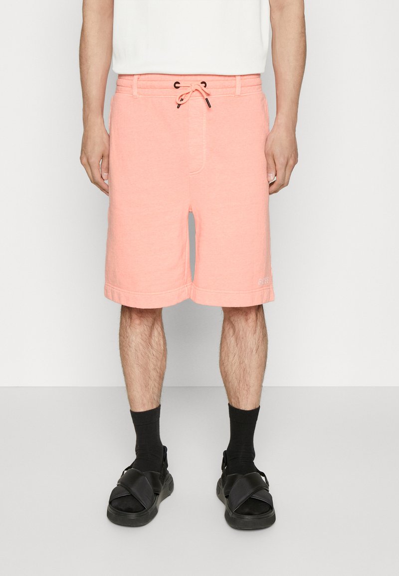 BOSS SENEON Tracksuit bottoms bright orange/orange Zalando.co.uk