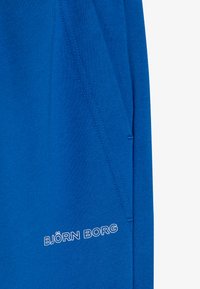 Björn Borg ESSENTIAL PANTS - Tréningruha alsók - olympian blue