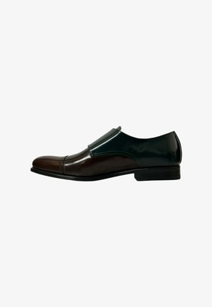 Herren-Zweifarbiger Lederschuh in Dunkelbraun und glänzendem Schwarz mit Cap-Toe und niedrigem Absatz, im Seitenprofil gezeigt.